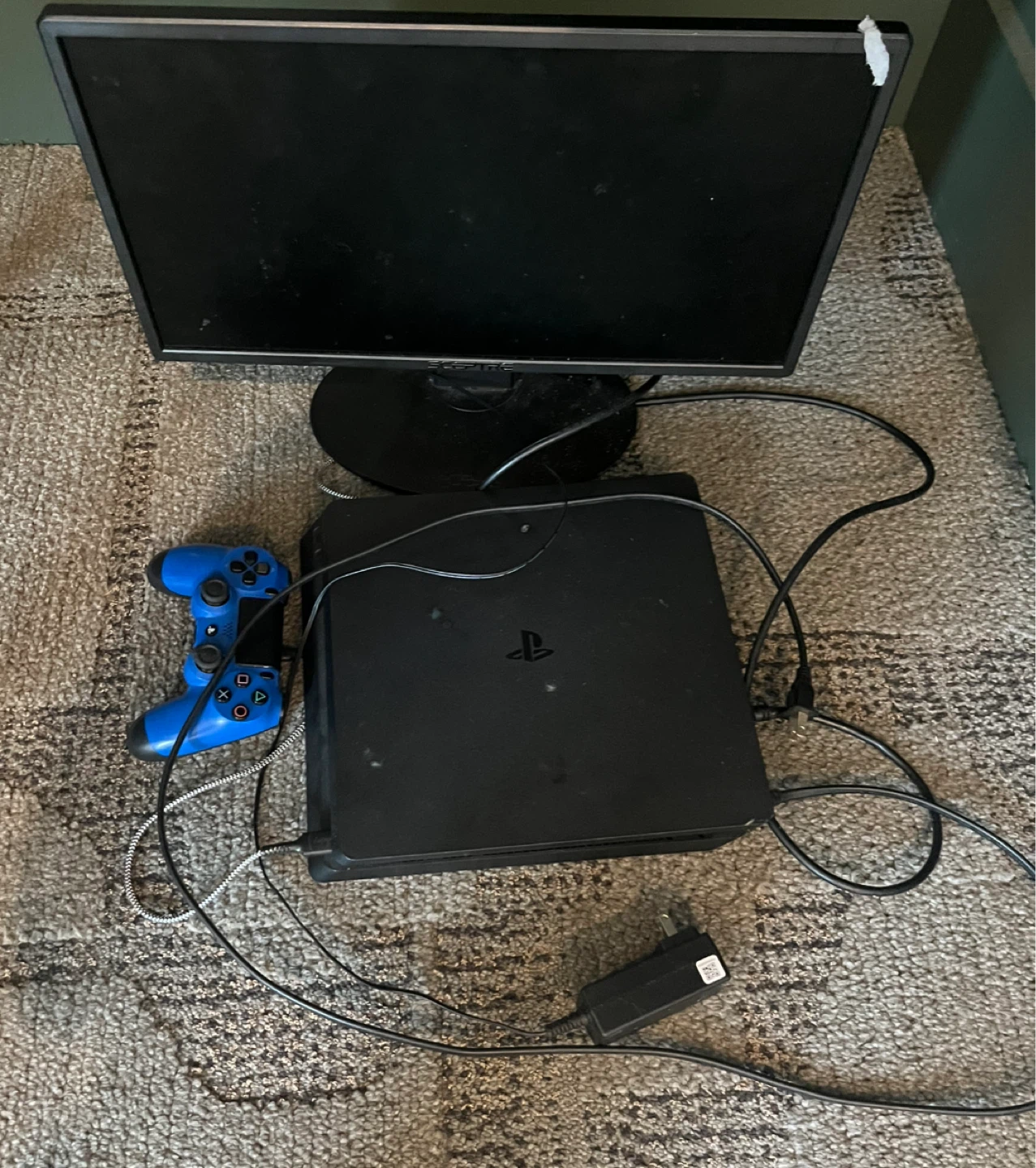 PlayStation 4 Console with Controller and Monitor