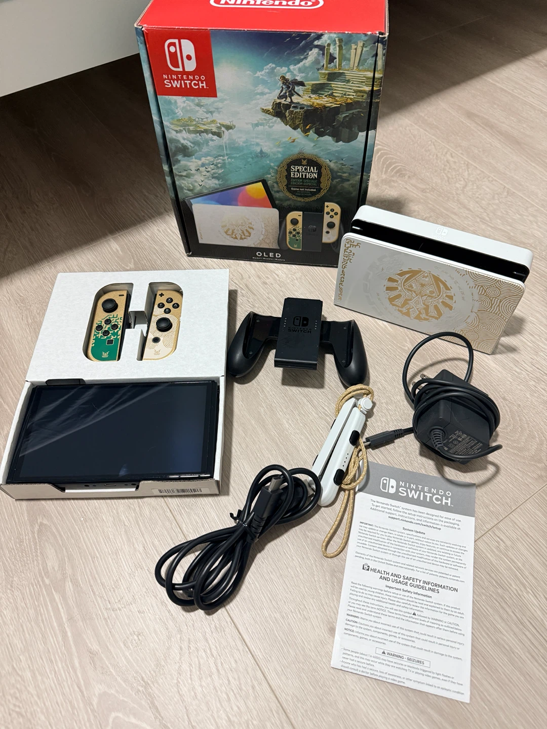 Nintendo Switch OLED Zelda Edition + Mario Kart – $360