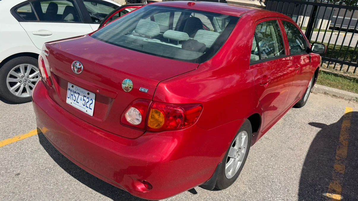 Red Toyota Corolla CE - photo 5