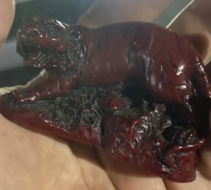 Cinnabar lacquer tiger figurine