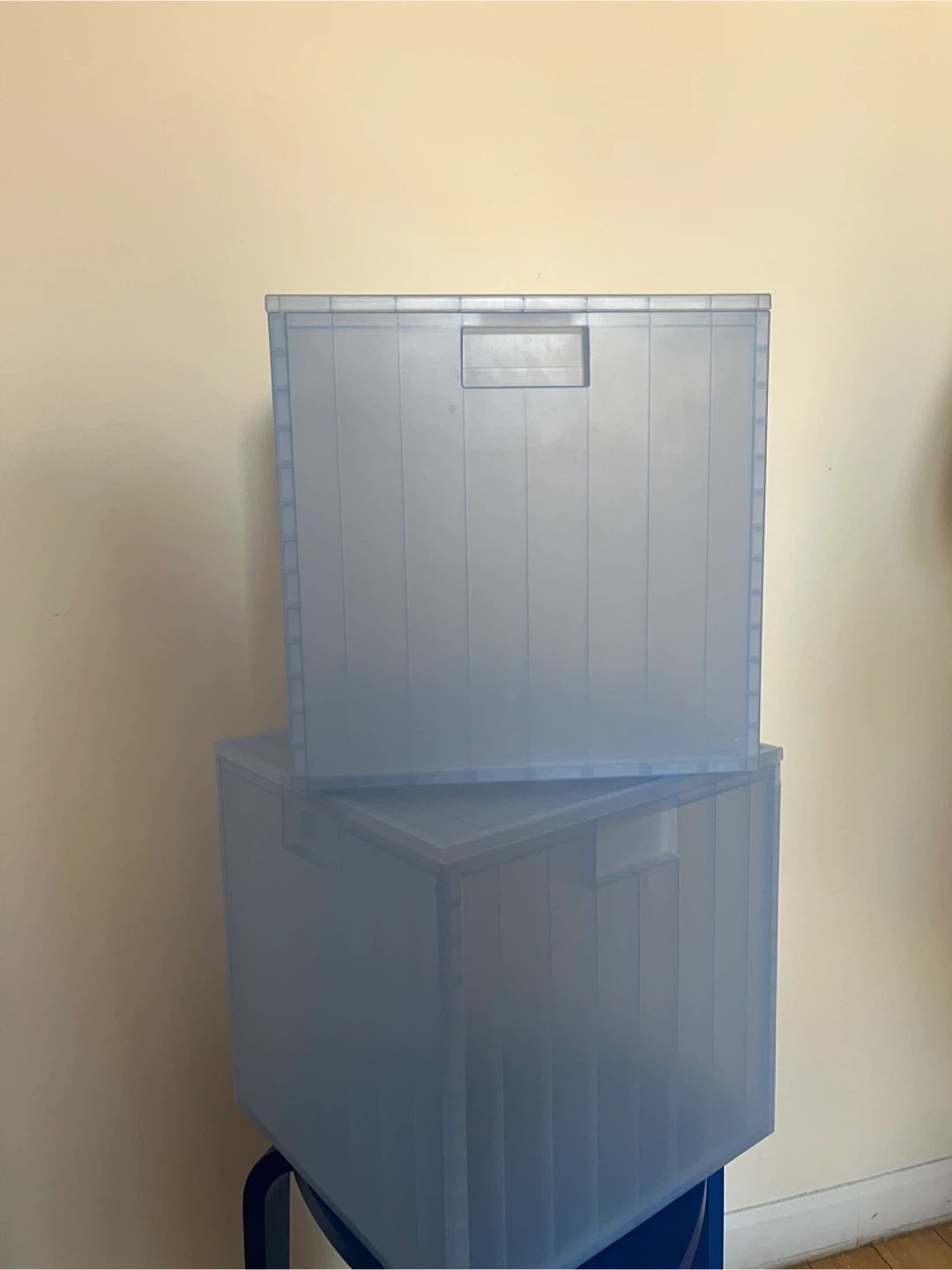 Two IKEA polypropylene storage boxes