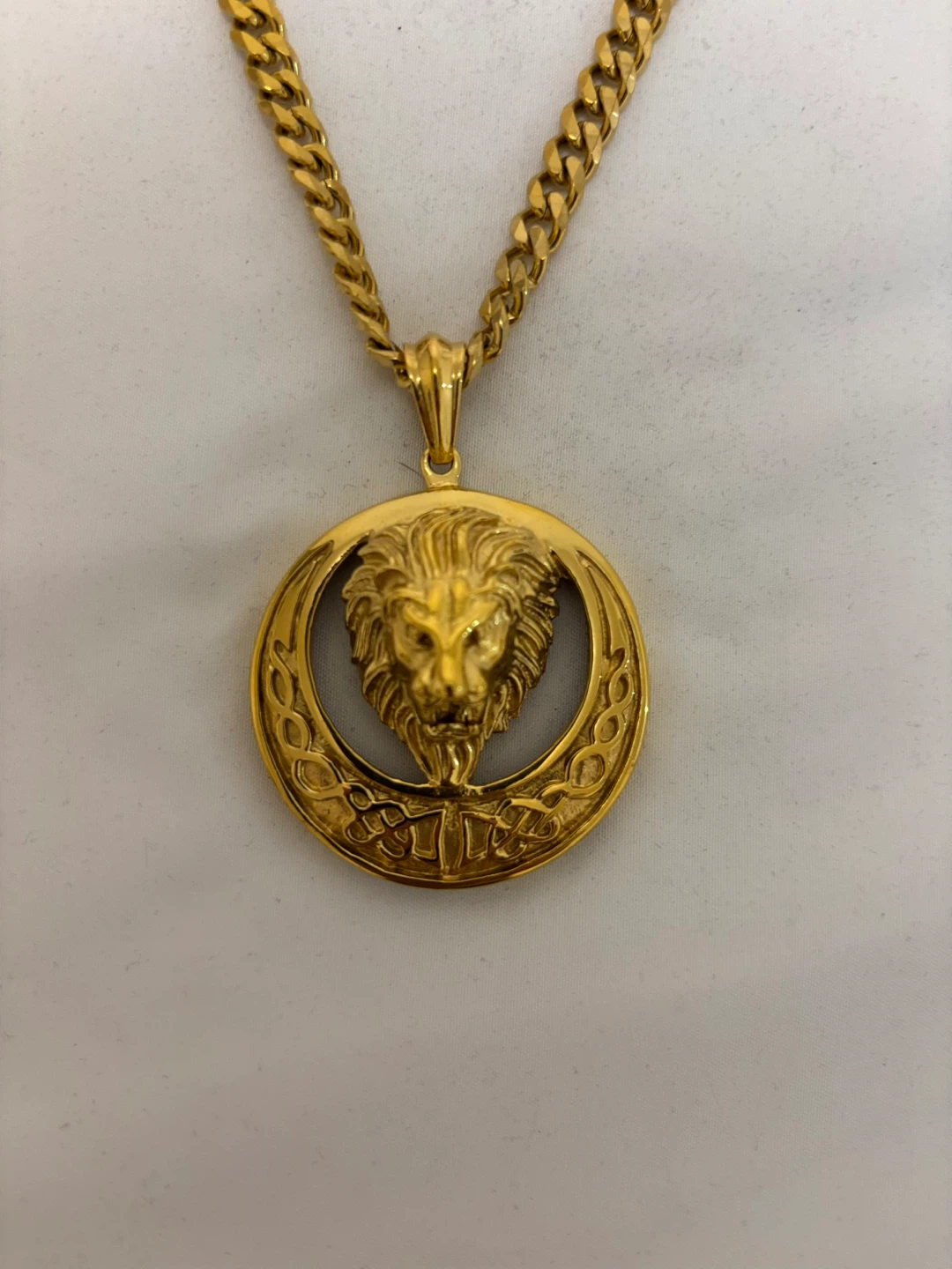 Gold-tone lion head pendant necklace