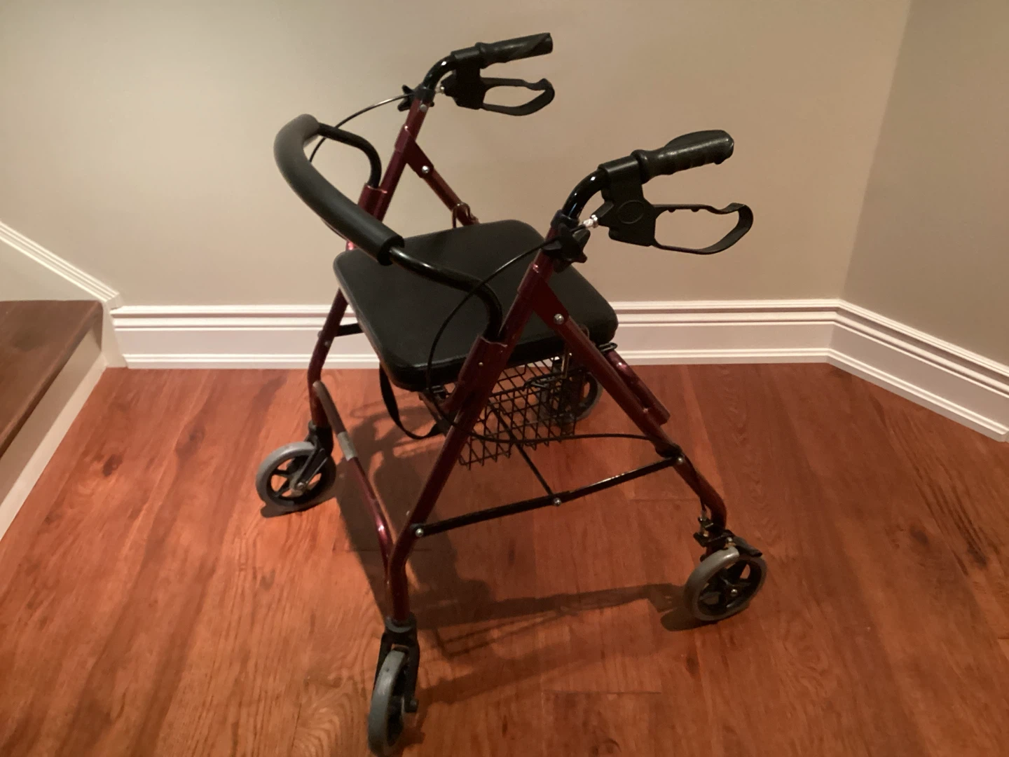 Walker with storage basket