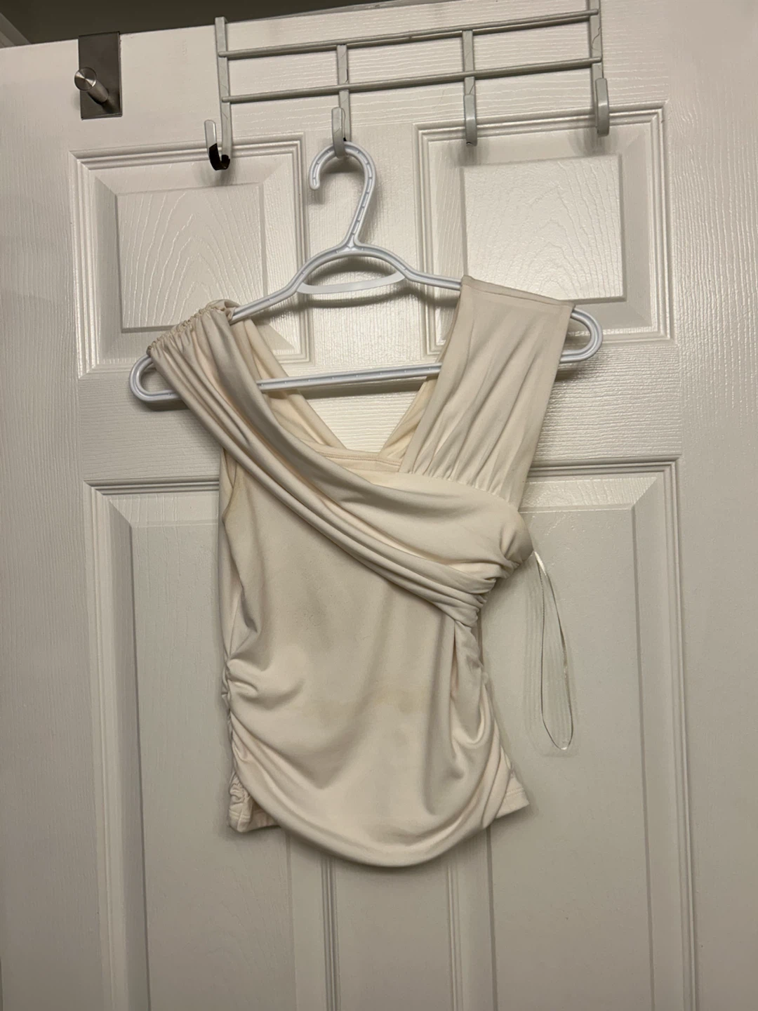 White ruched wrap-style sleeveless top