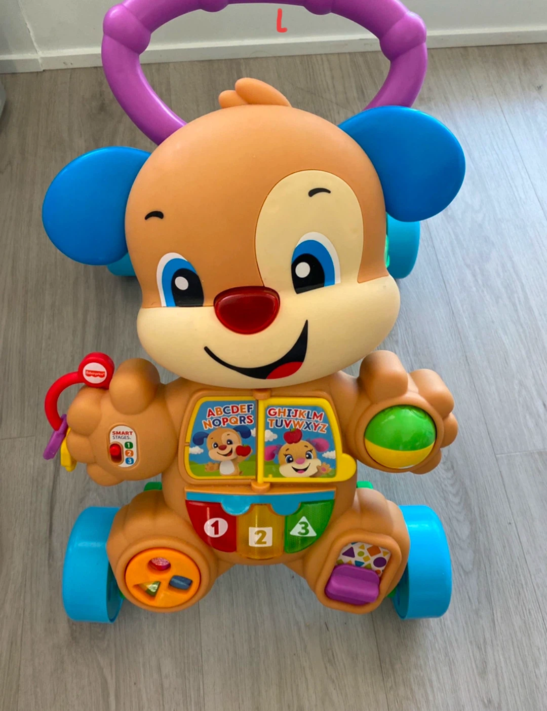 Fisher-Price Laugh and Learn Stride-to-Ride Puppy