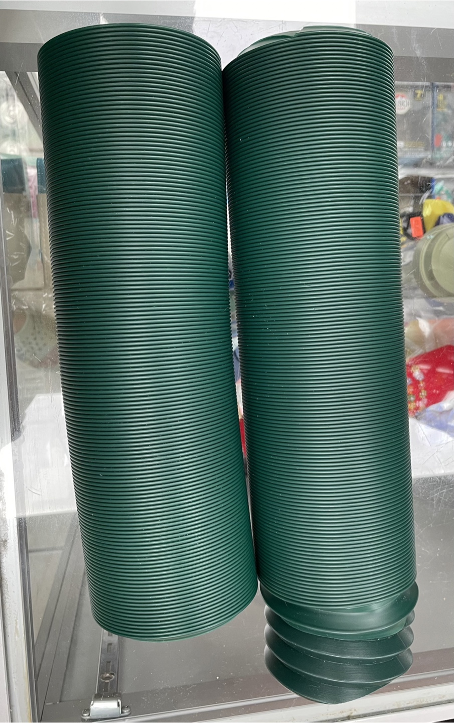 Pair of Green Plastic Flexible Tubing Extensions