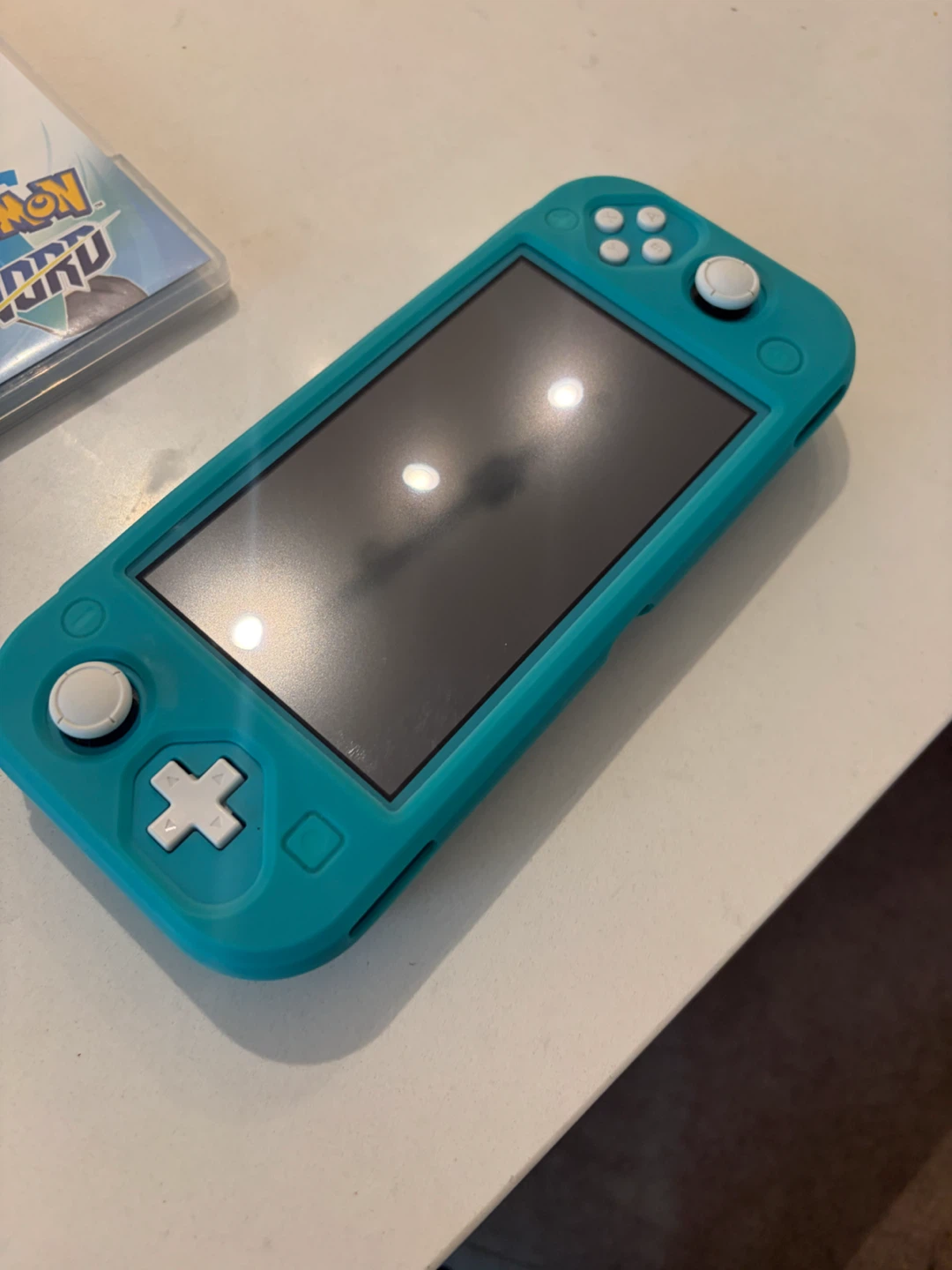 Nintendo Switch Lite with Pokemon Sword - photo 2