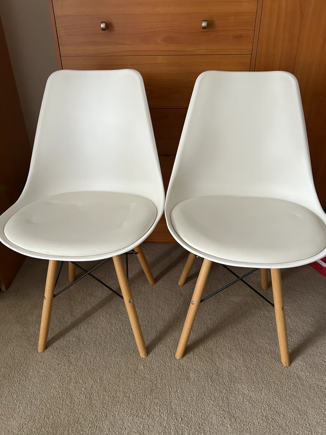 Set of two white Eames-style dining chairs