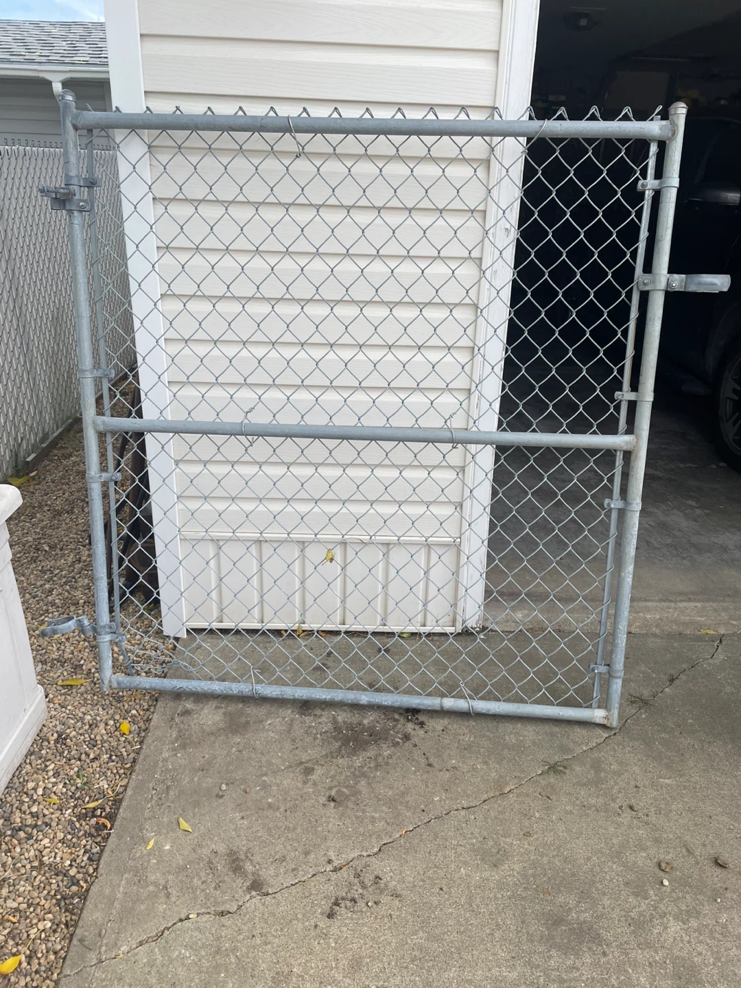 Assorted chain-link fence parts and accessories