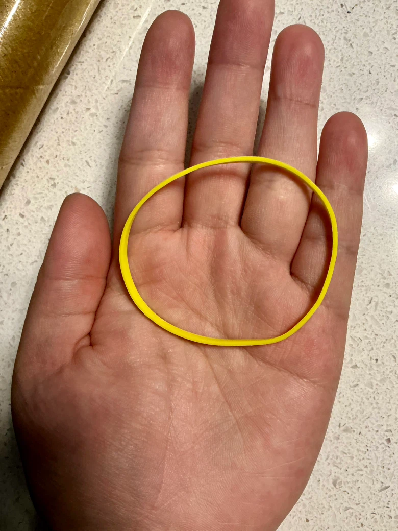 Single yellow rubber band - photo 2