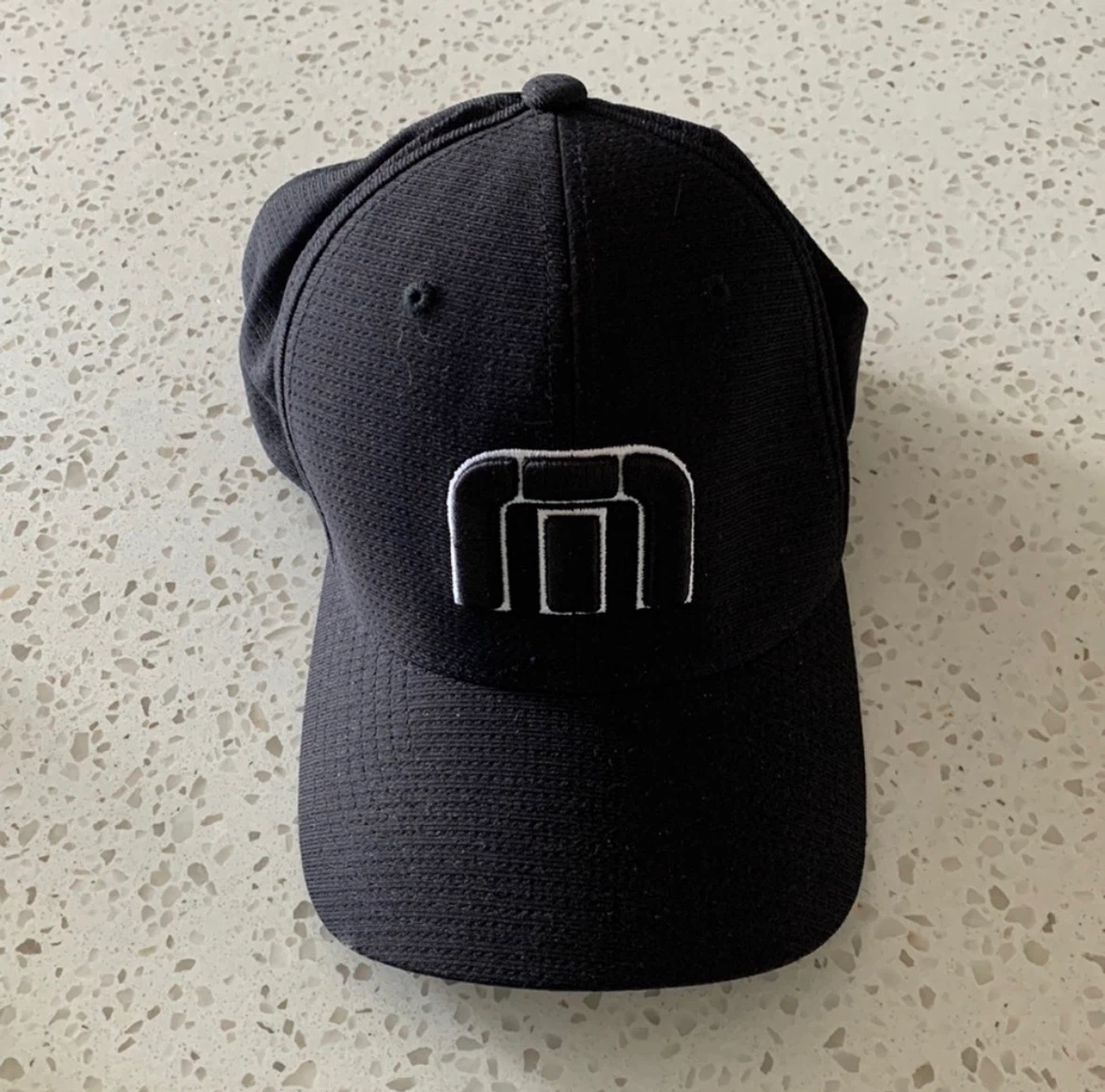 TravisMathew Black Flexfit Hat