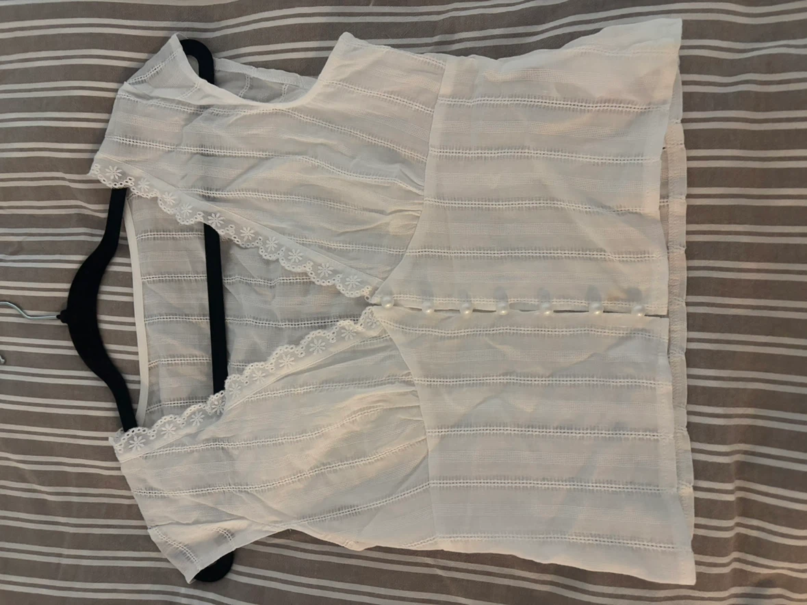 White button-down blouse