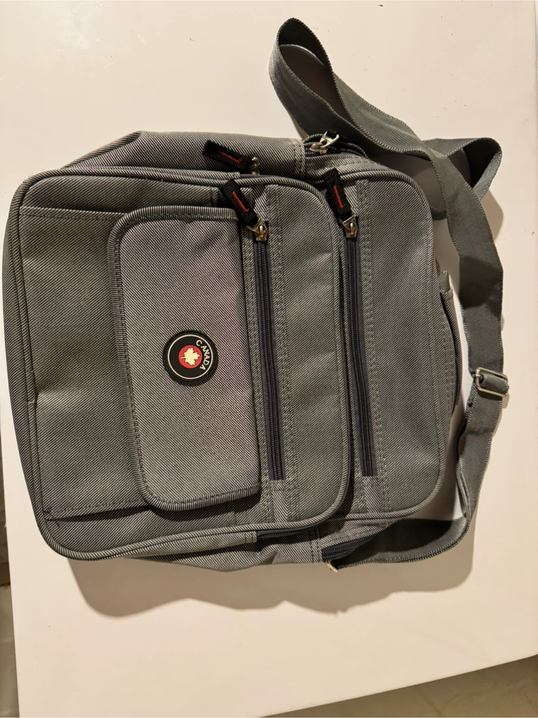 Grey Canada Crossbody Bag