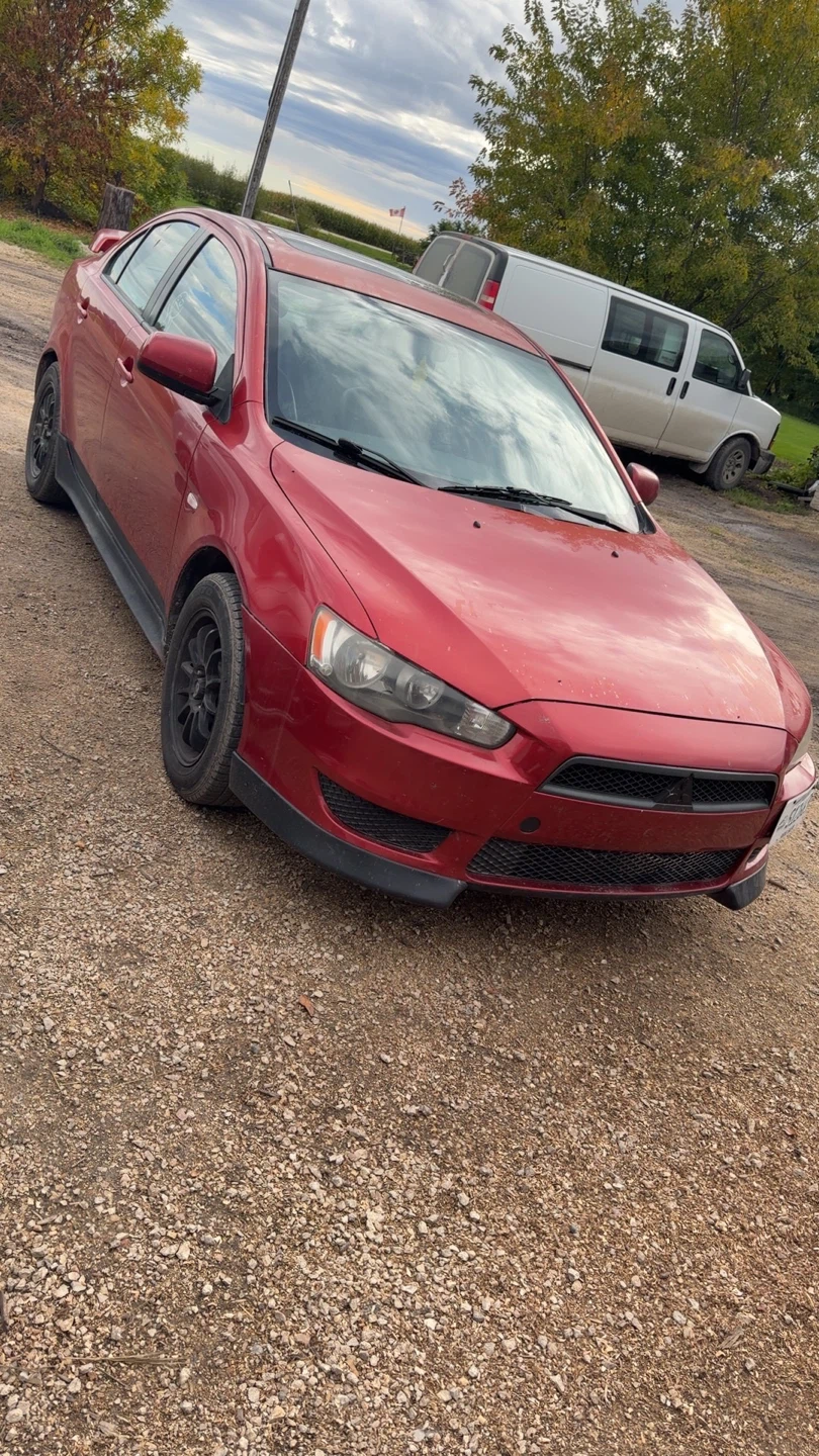Red Mitsubishi Lancer