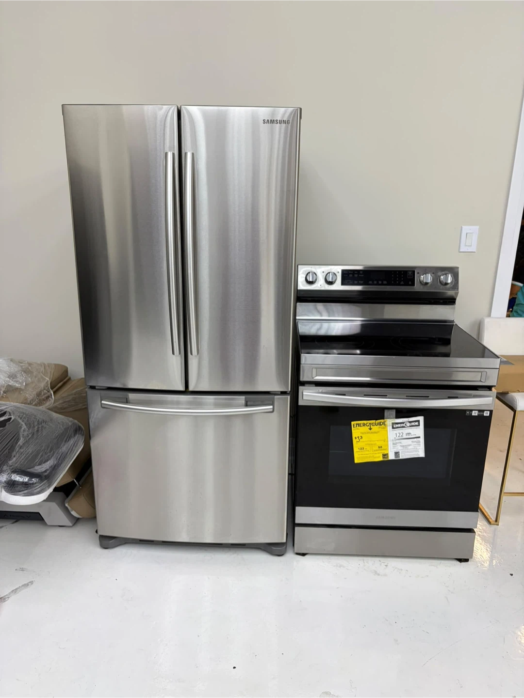 Samsung Stainless Steel Electric Range and fridge