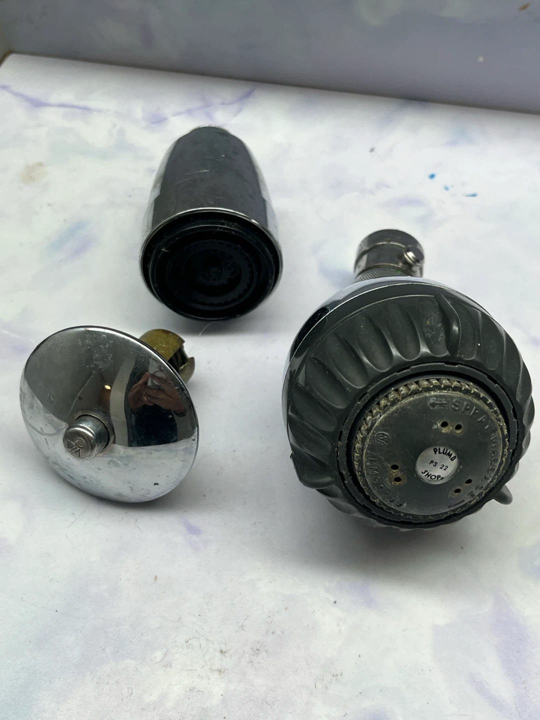 Free old shower heads & sink plug