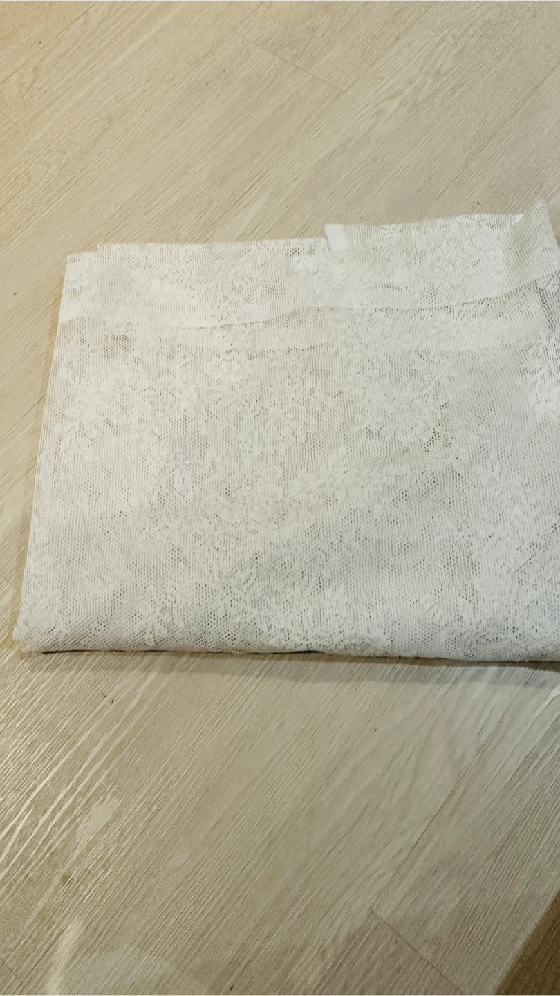 White lace curtain panel