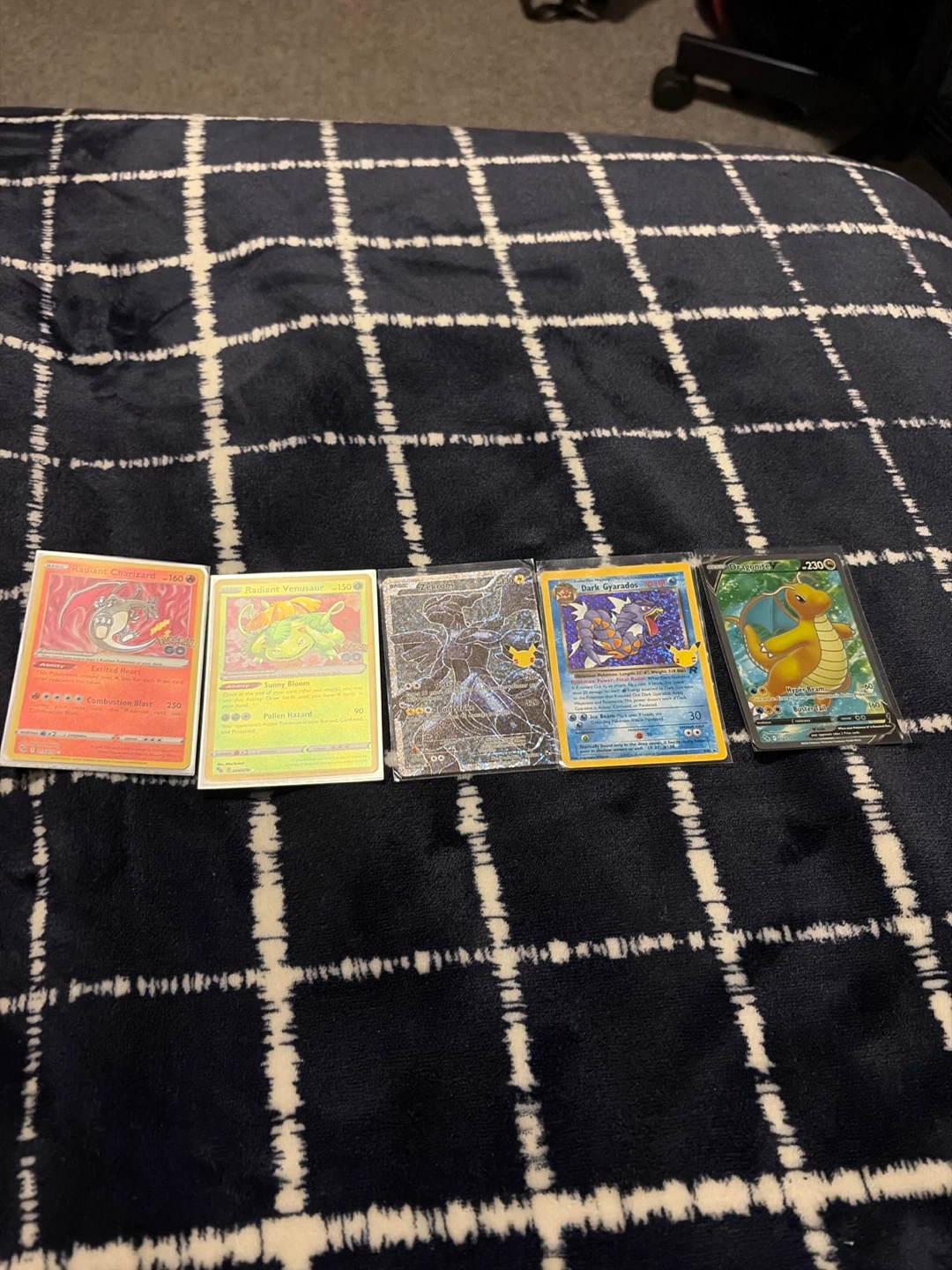 Five holographic Pokémon cards