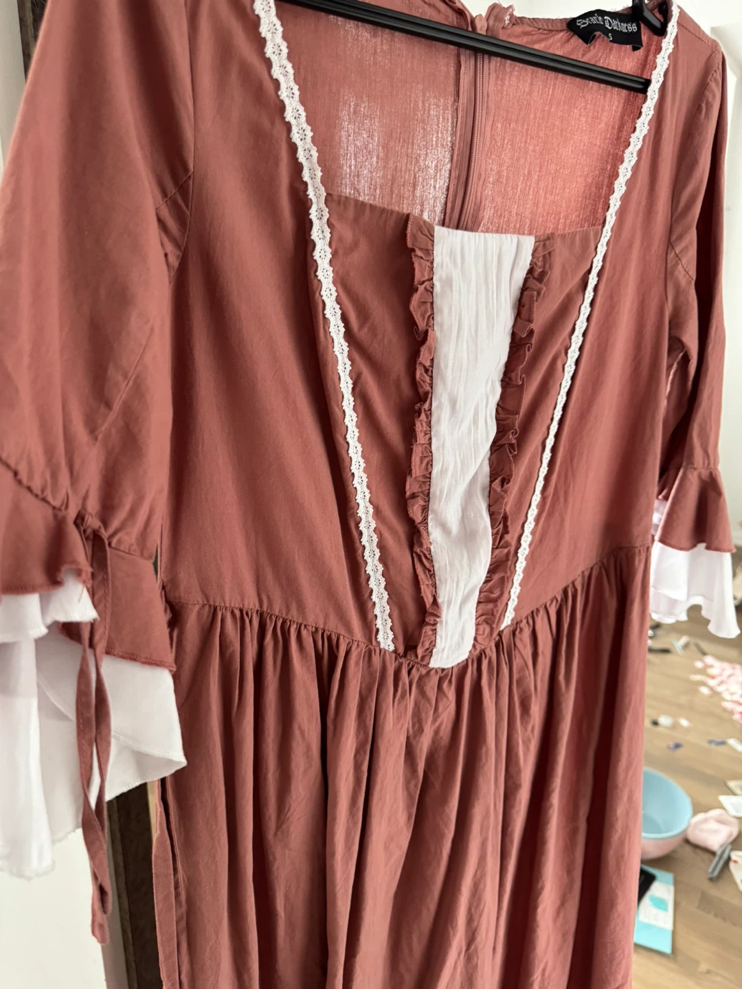 Scarlet Darkness rust-coloured dress