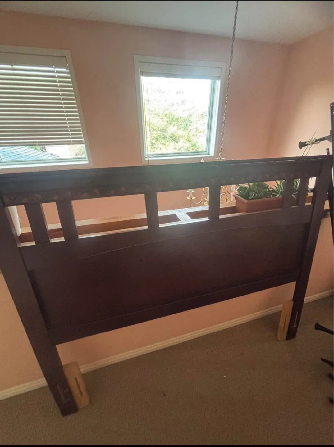 Dark wood bed headboard