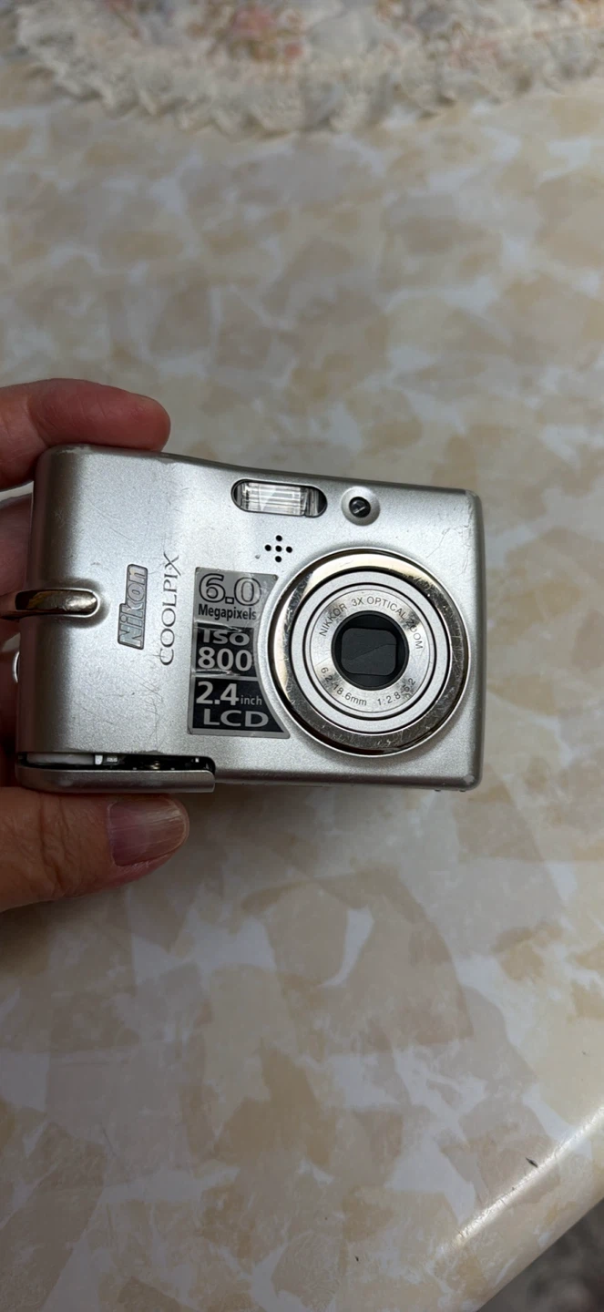 Nikon Coolpix L11 Digital Camera + 2GB Lexar SD Card