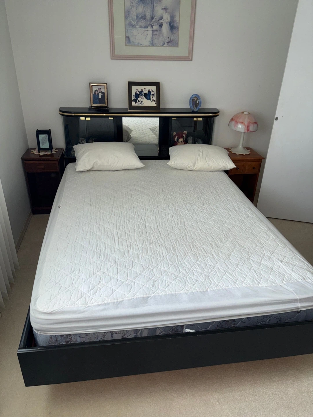 Black queen bed frame with integrated headboard
