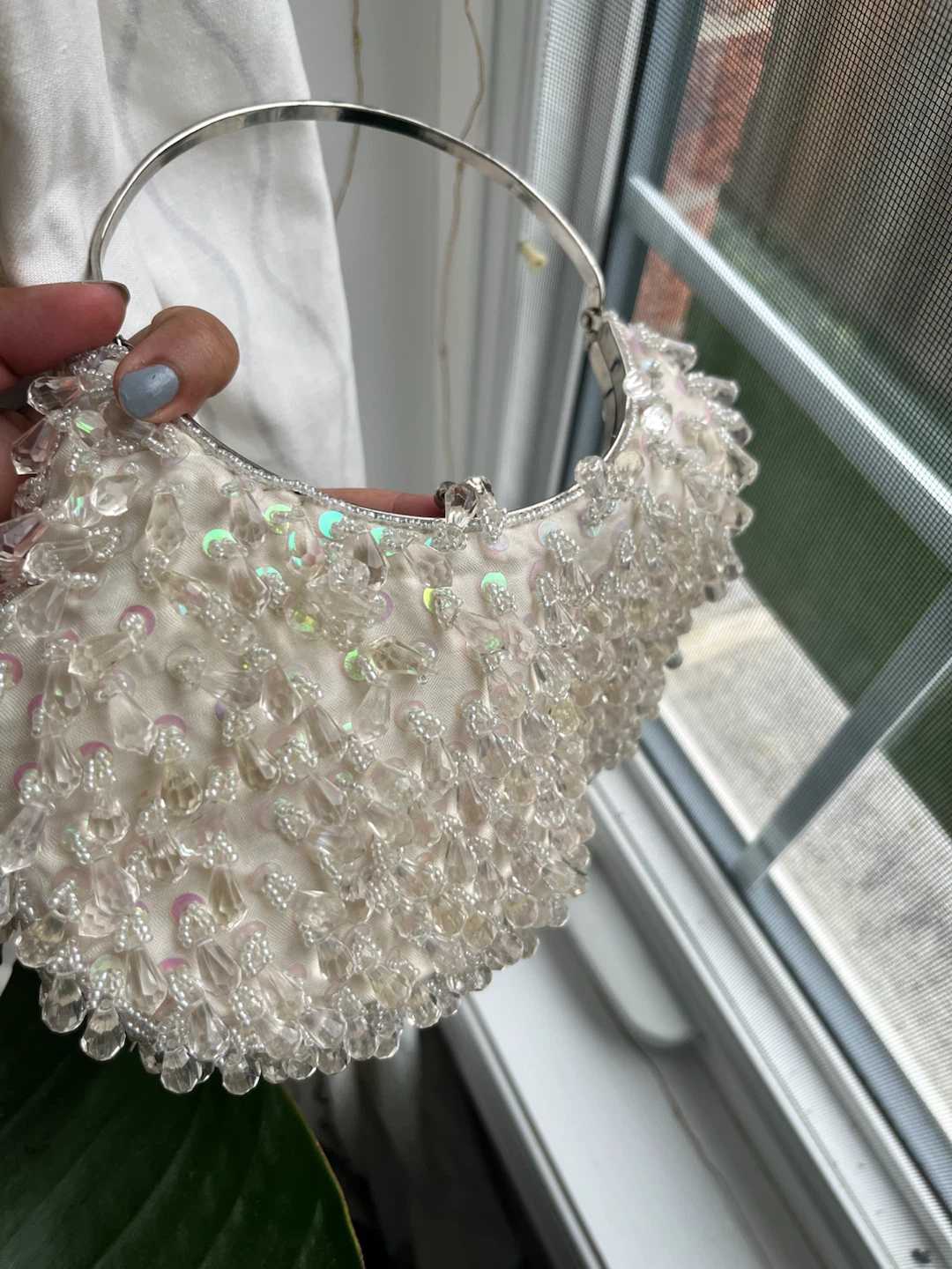 White beaded evening handbag