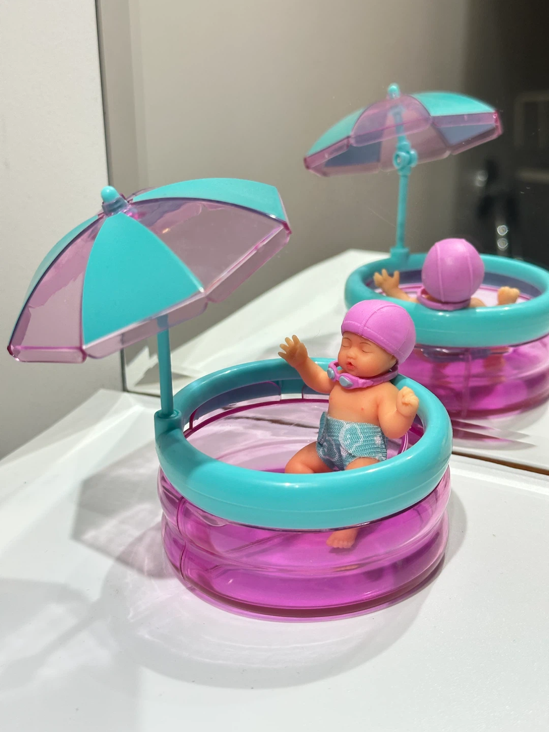 Collectible ZURU My Mini Baby doll with swimming pool set
