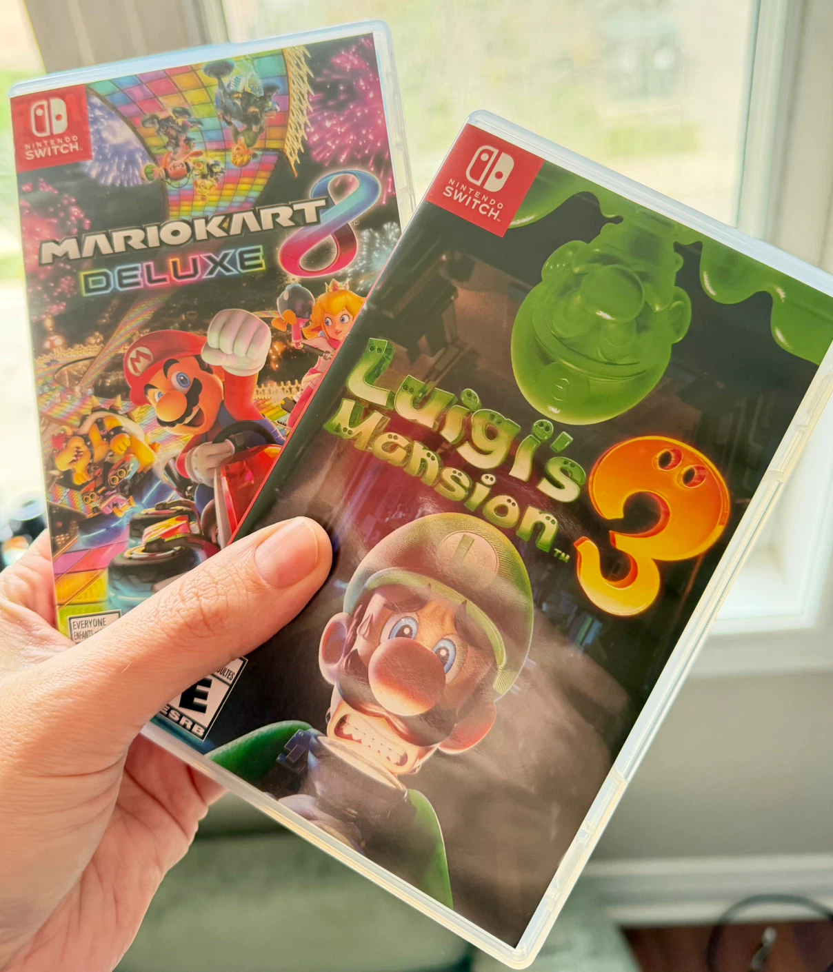 Nintendo Switch Games - Luigi’s Mansion and Mario Kart 8
