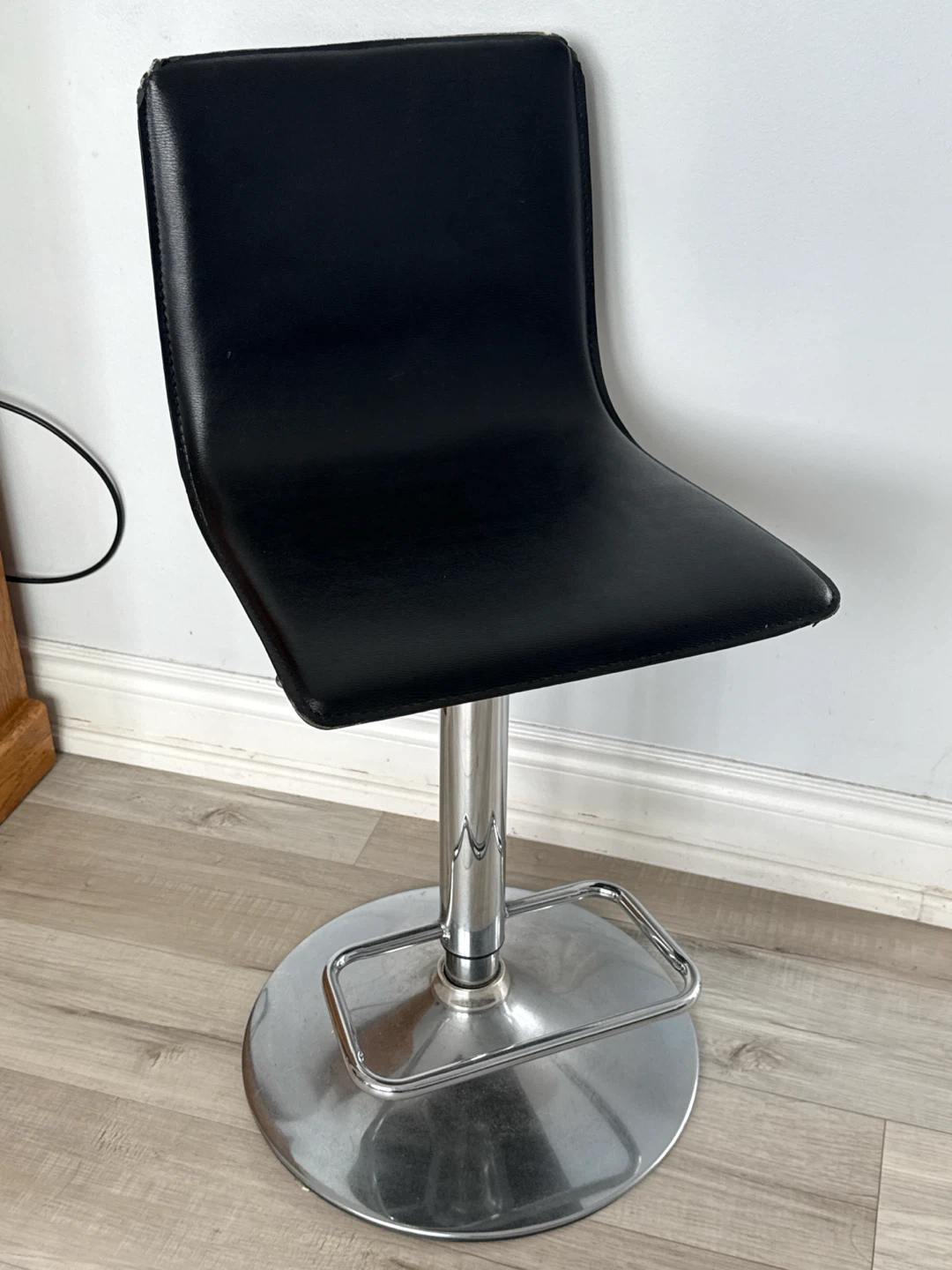 Black adjustable bar stool