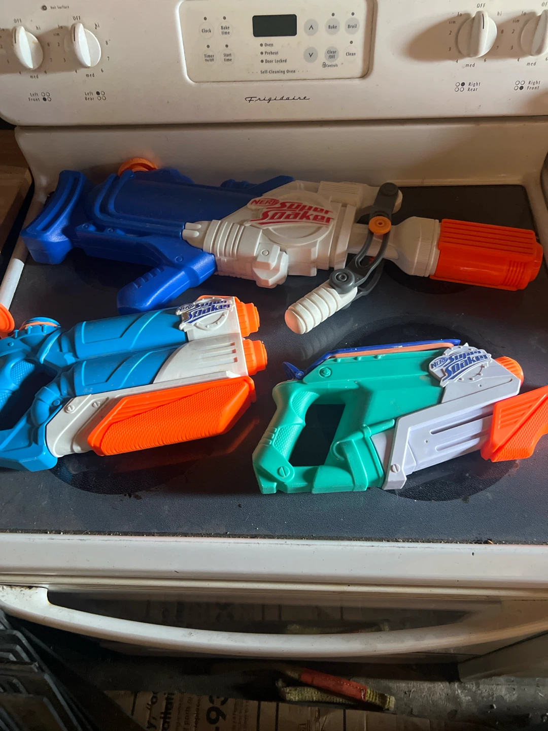 Three Nerf Super Soaker Water Blasters