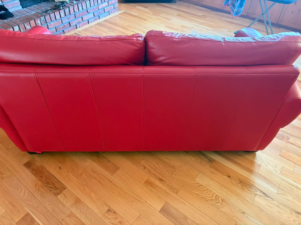 Red leather two-seater sofa - photo 4