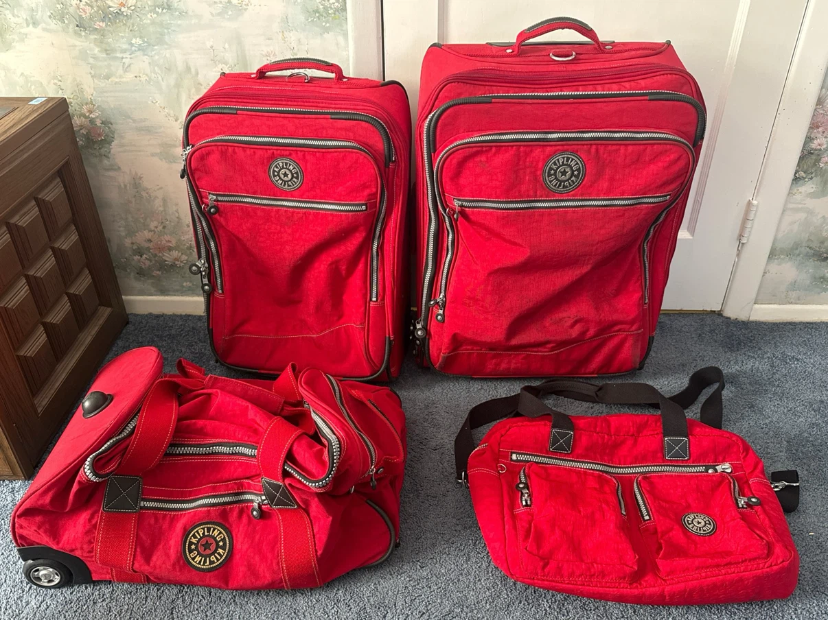 Kipling Red Rolling Luggage Set