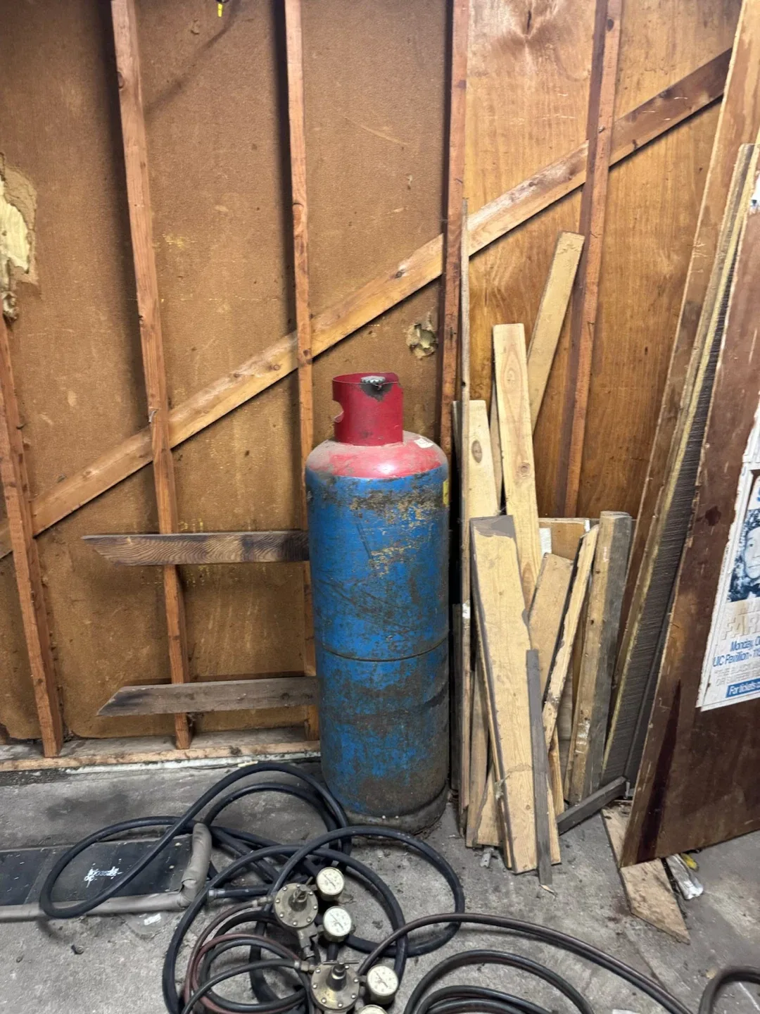 Large Blue and Red Industrial Propane Tank