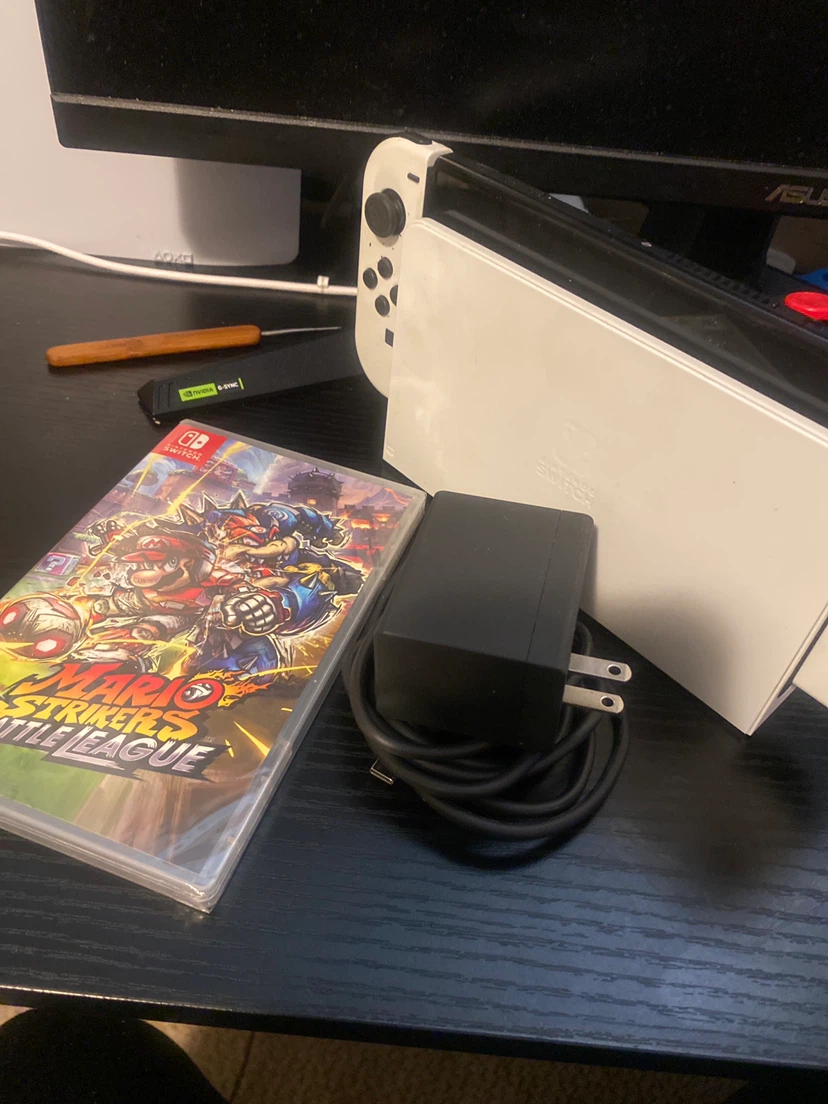 Nintendo Switch OLED Model and Mario Strikers Game