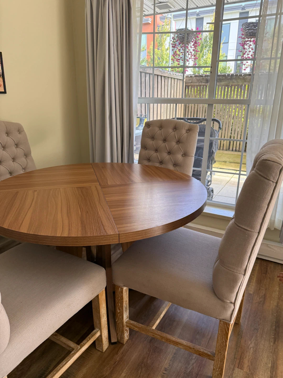 Round Dining Table and Four Tufted Chairs