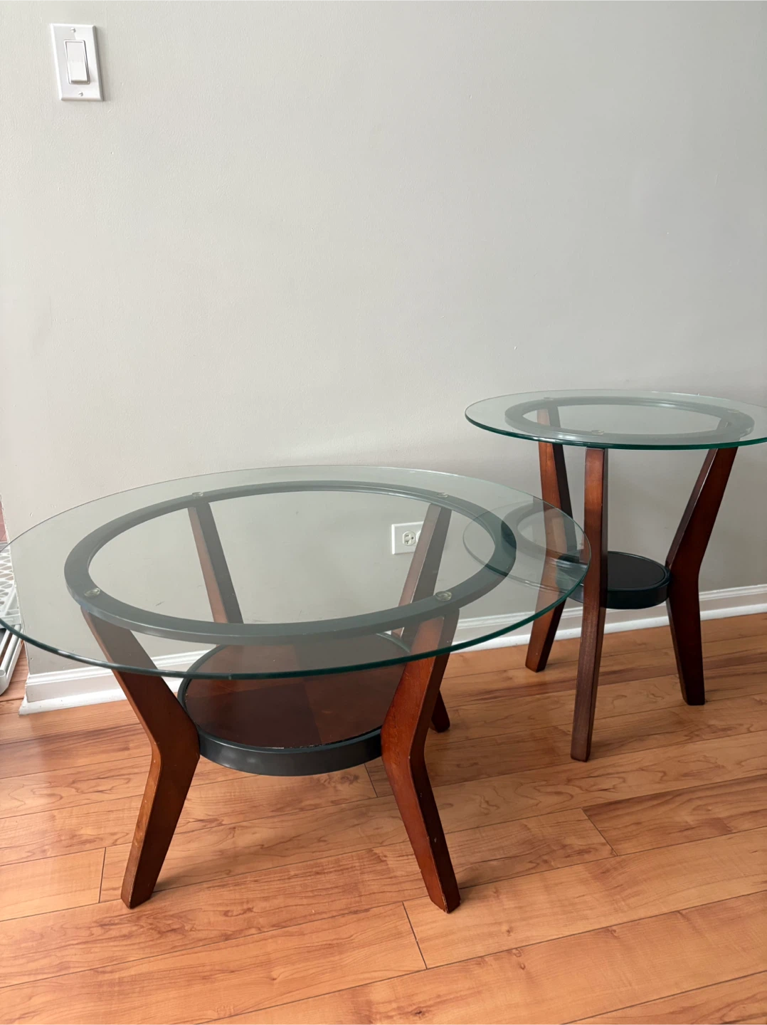 Set of Two Round Glass and Wood Tables