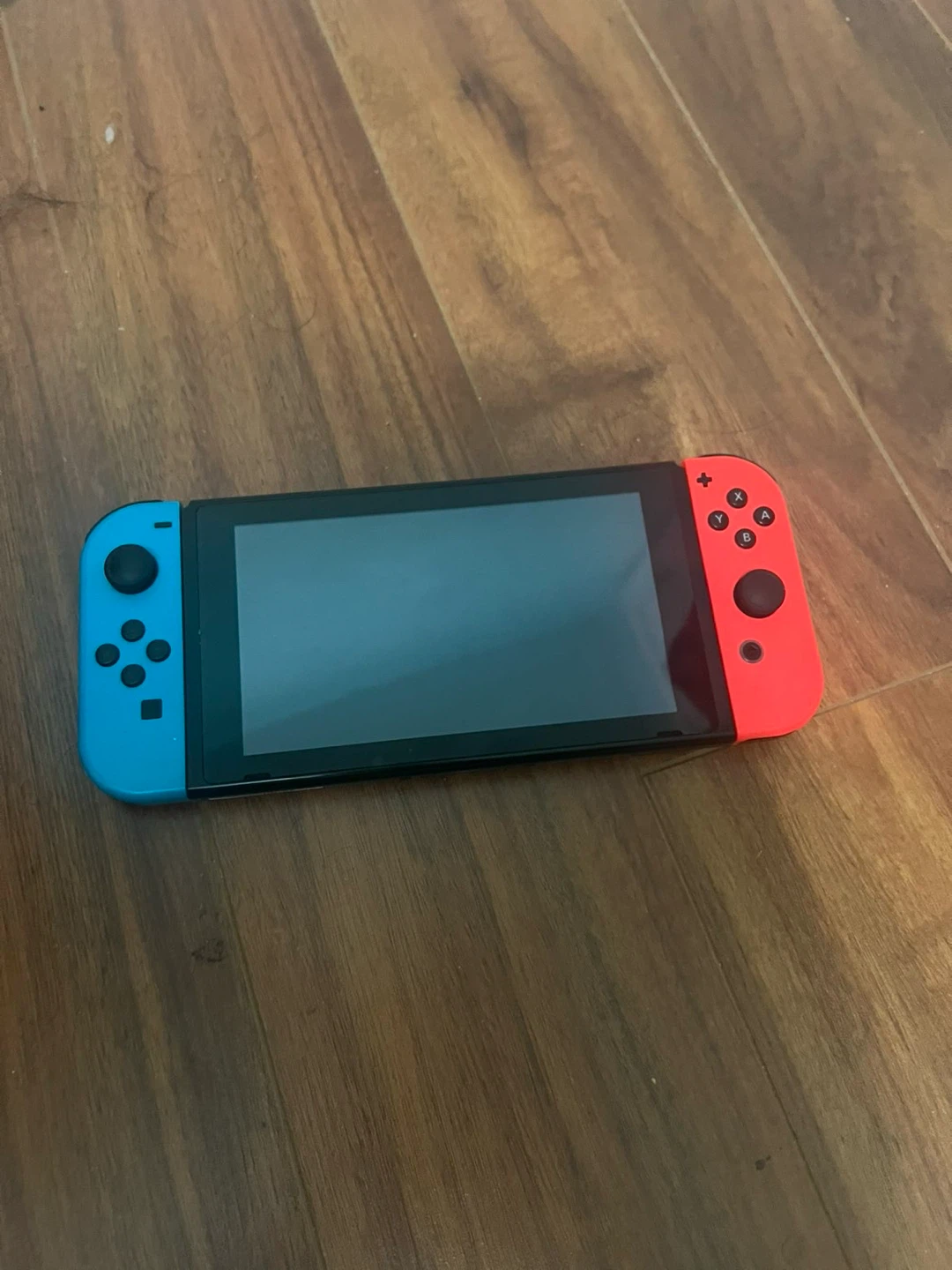 Nintendo Switch Console with Neon Controllers
