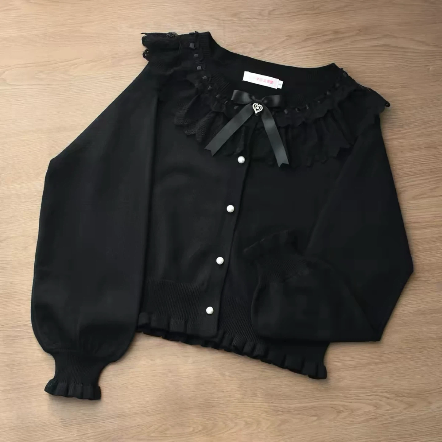 Black Ruffled Cardigan with Pearl Buttons