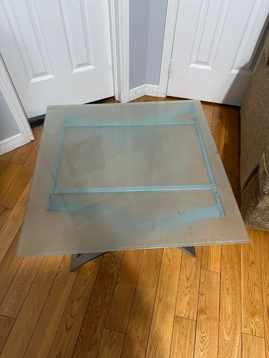 Frosted glass side table with metal base