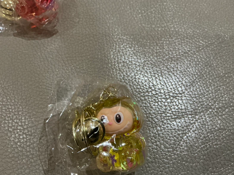 Cute Labubu character keychains - photo 4