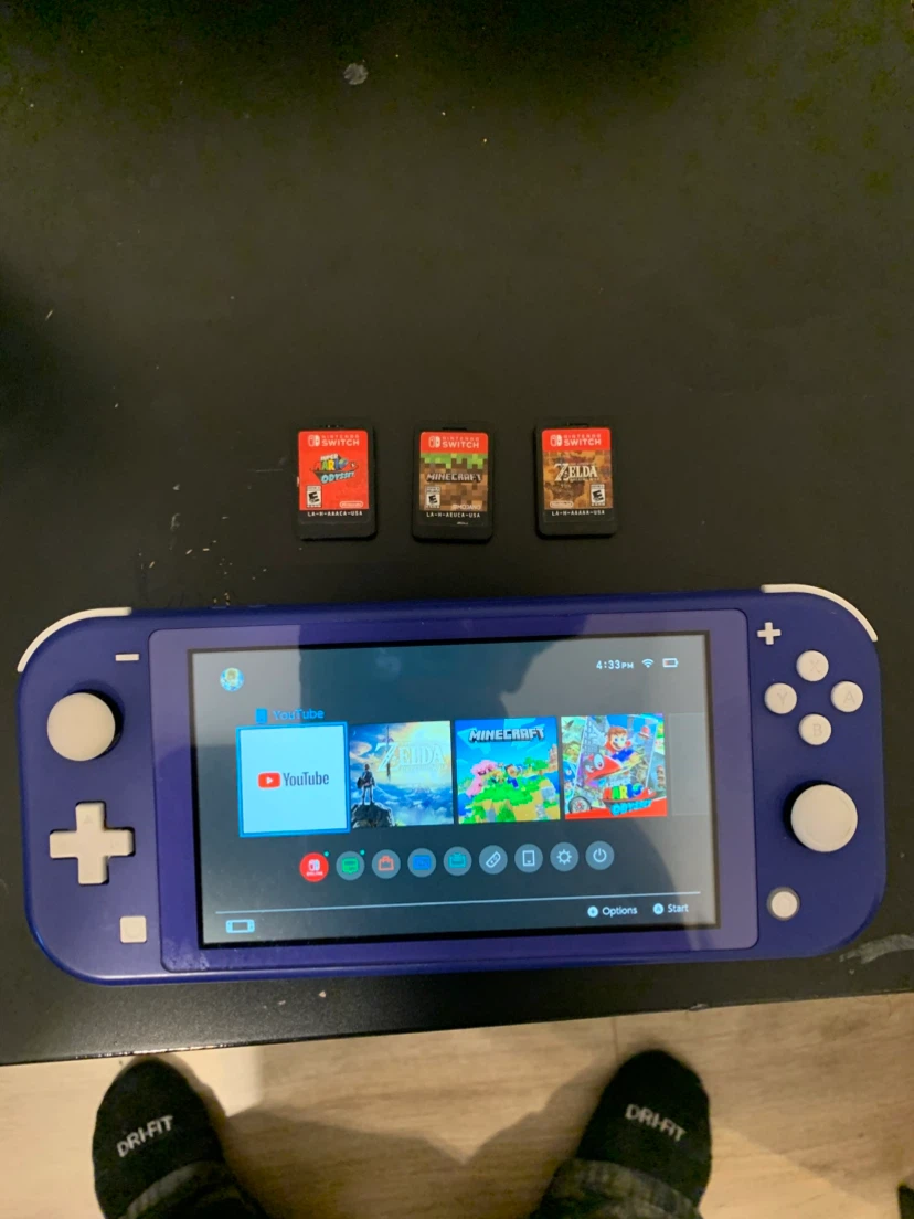 Nintendo Switch Lite Blue with 3 Games
