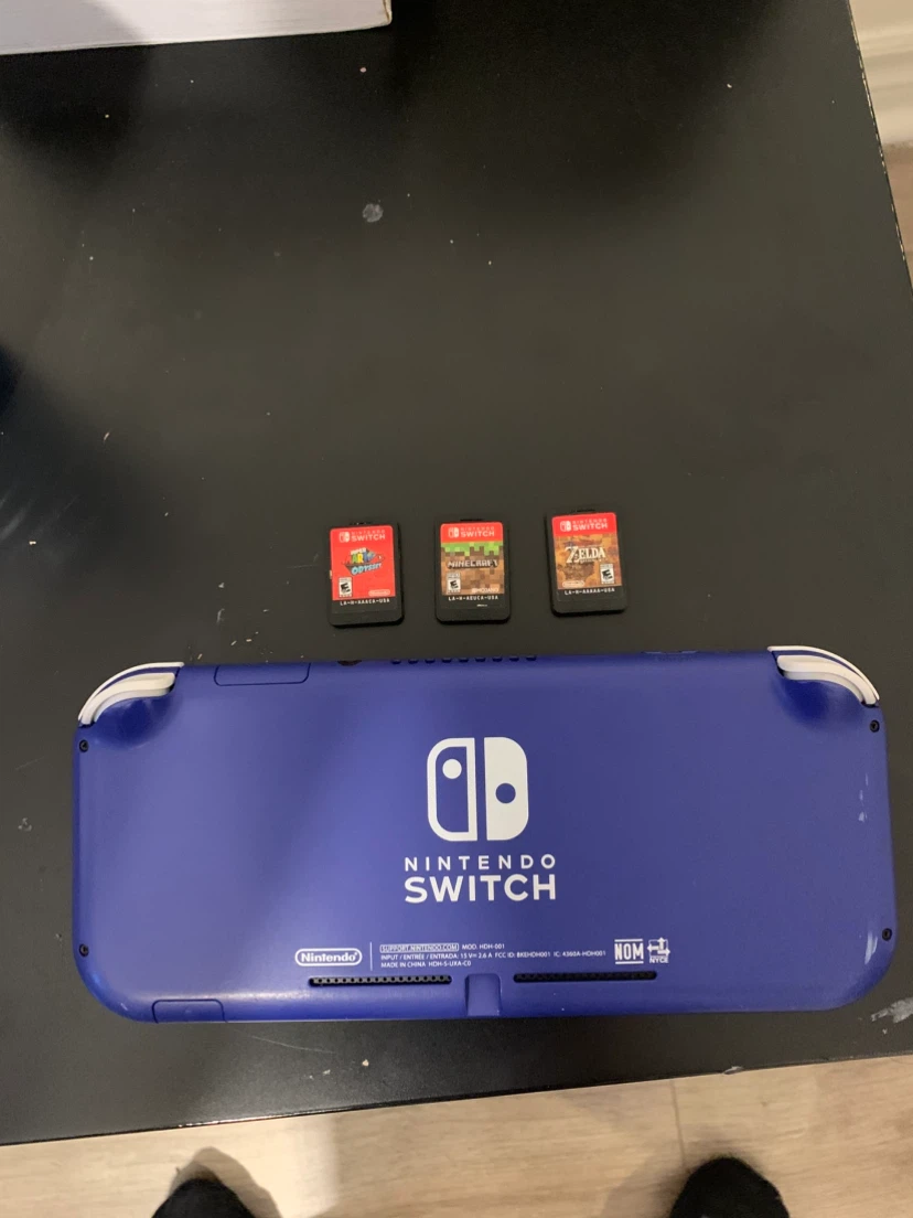 Nintendo Switch Lite Blue with 3 Games - photo 2