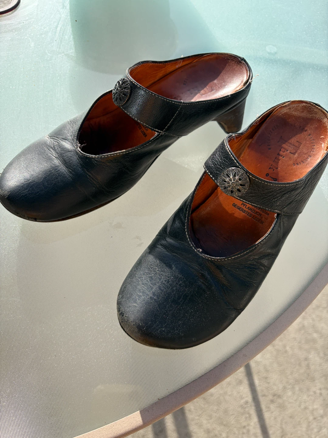 Think! Black Leather Clogs