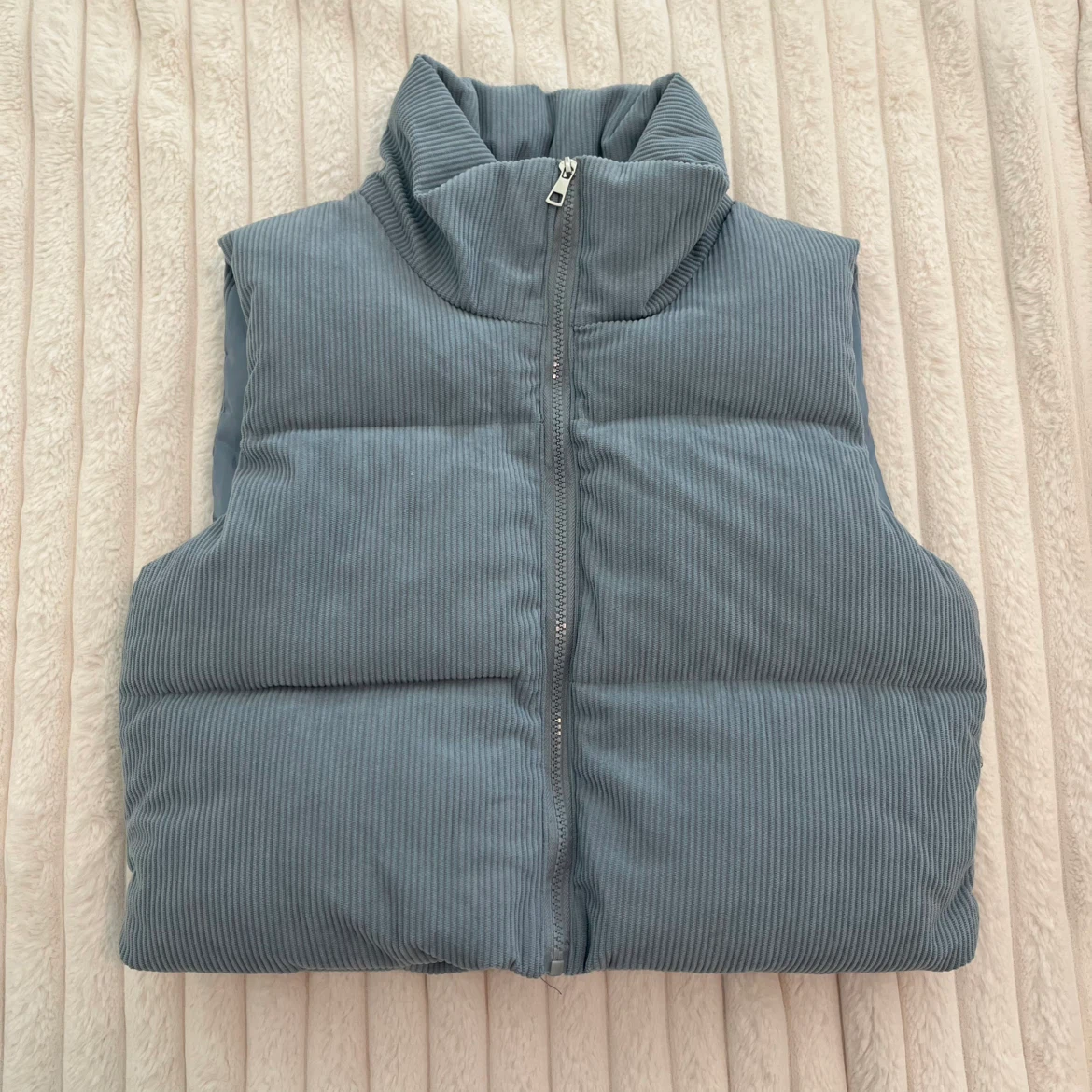 Blue corduroy mini puffer vest