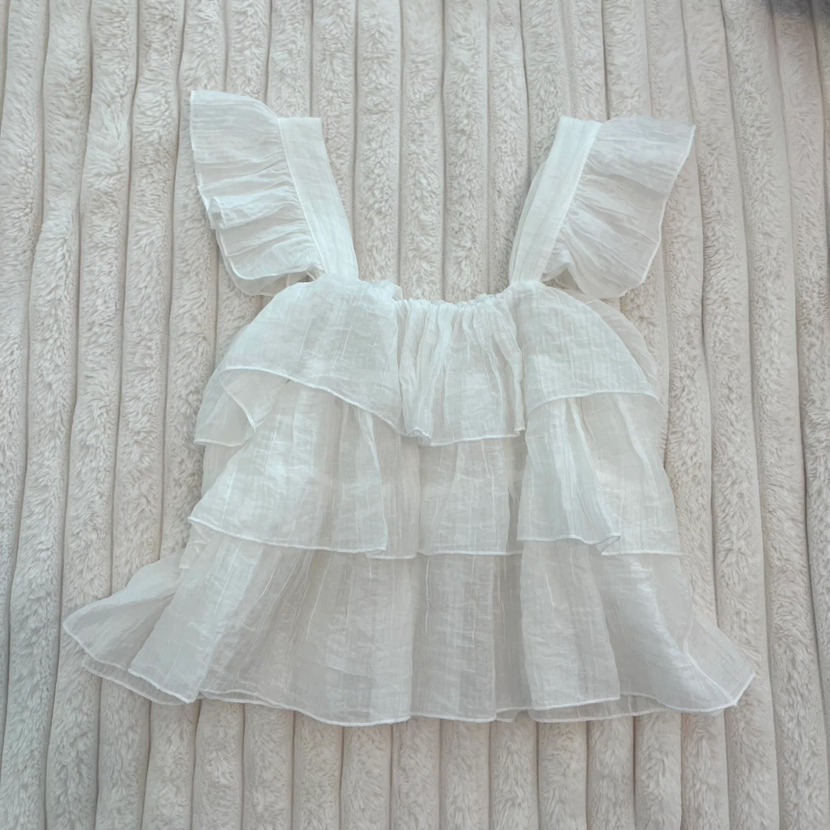 White Ruffled Sleeveless Top