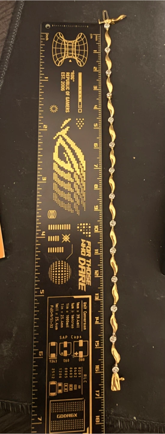 Gold 10 k bracelet with diamonds - photo 2