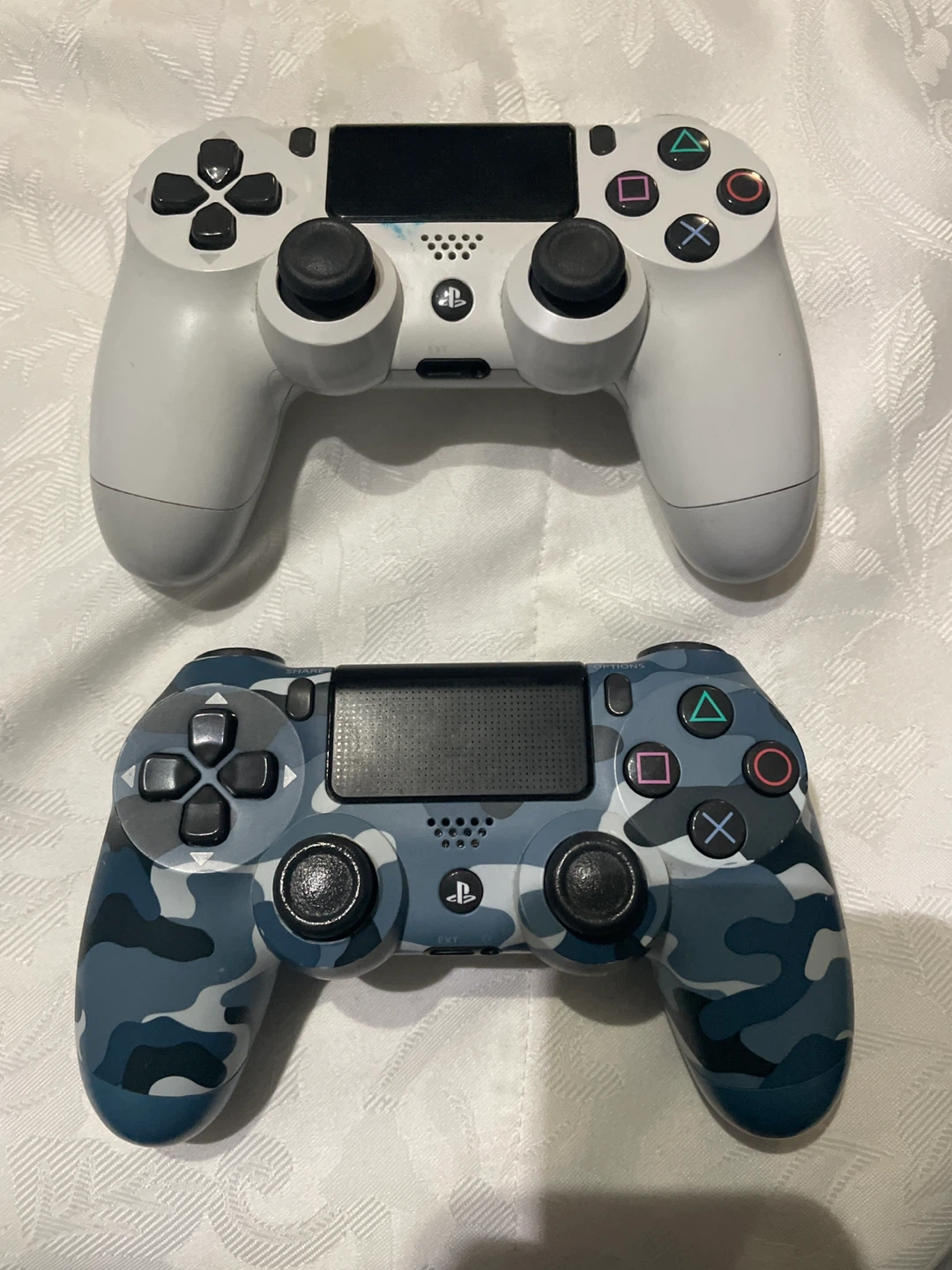 Two Sony PlayStation 4 DualShock Wireless Controllers