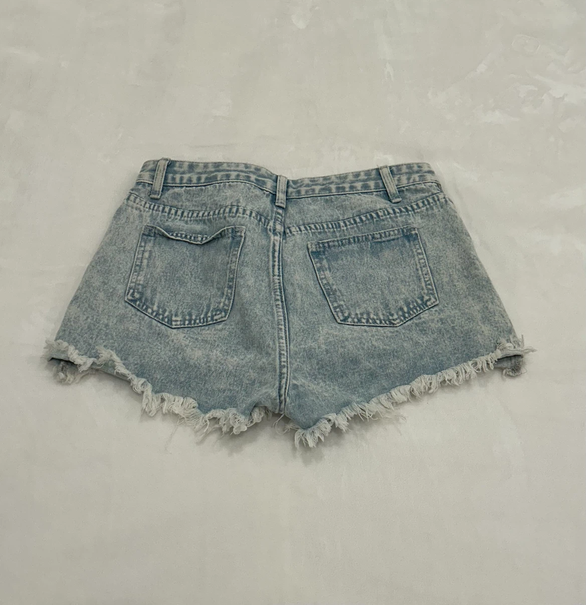 Light wash denim shorts - photo 2