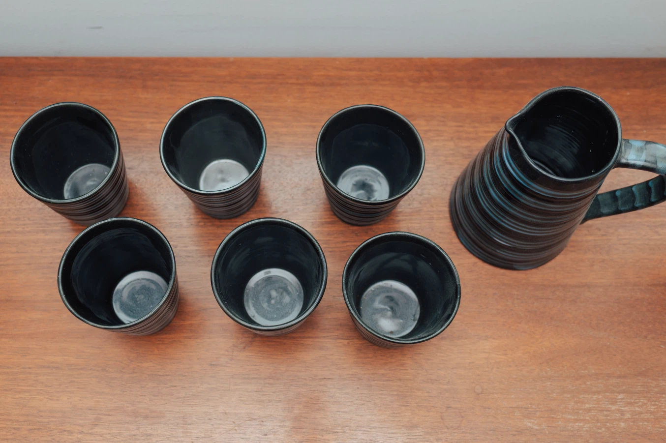 Handmade Ribbed Black Glaze Pottery Pitcher & 6 Cups - photo 2